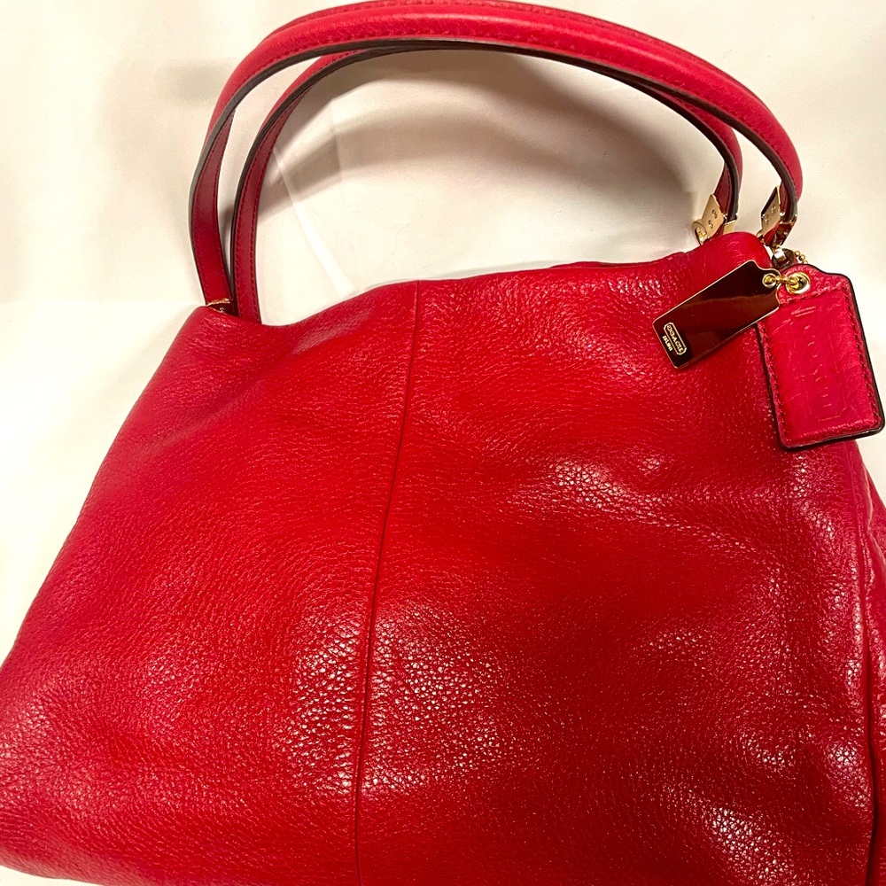 Newish beautiful red Coach bag.